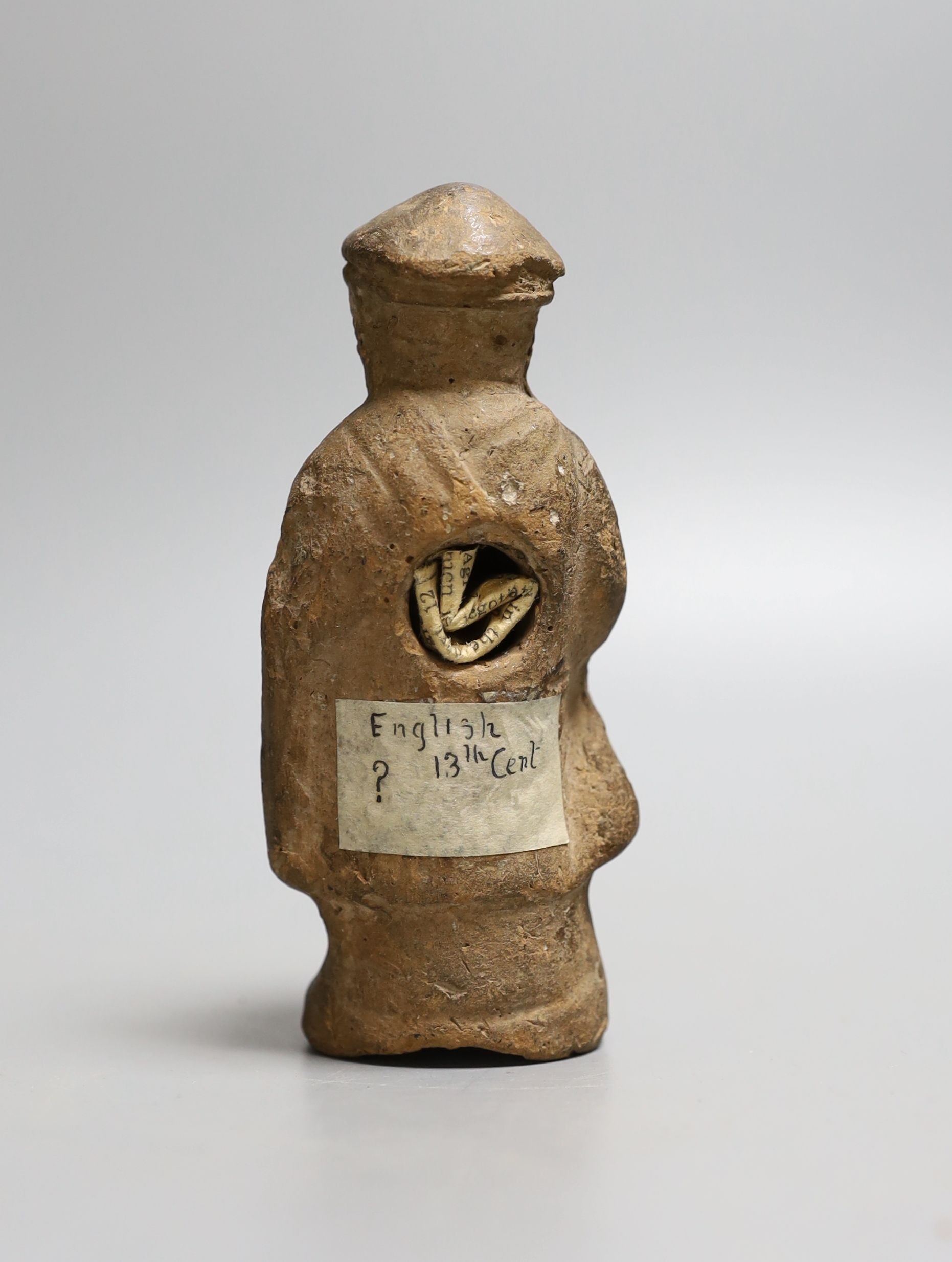 A terracotta figure of a man, possibly possibly mediaeval 13th century - 11cm tall